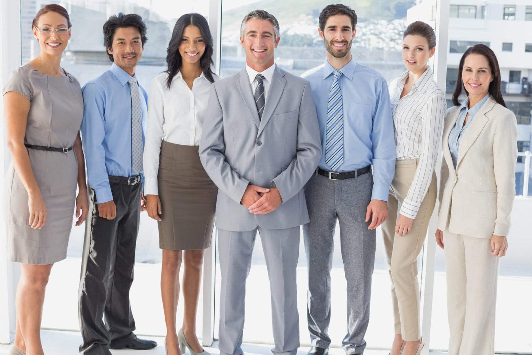 Professional diverse team of businesspeople in office setting.